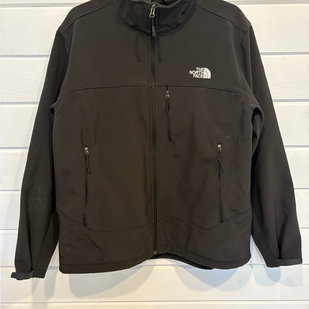 The North Face Black Performance Jacket with Water-Resistant Fabric